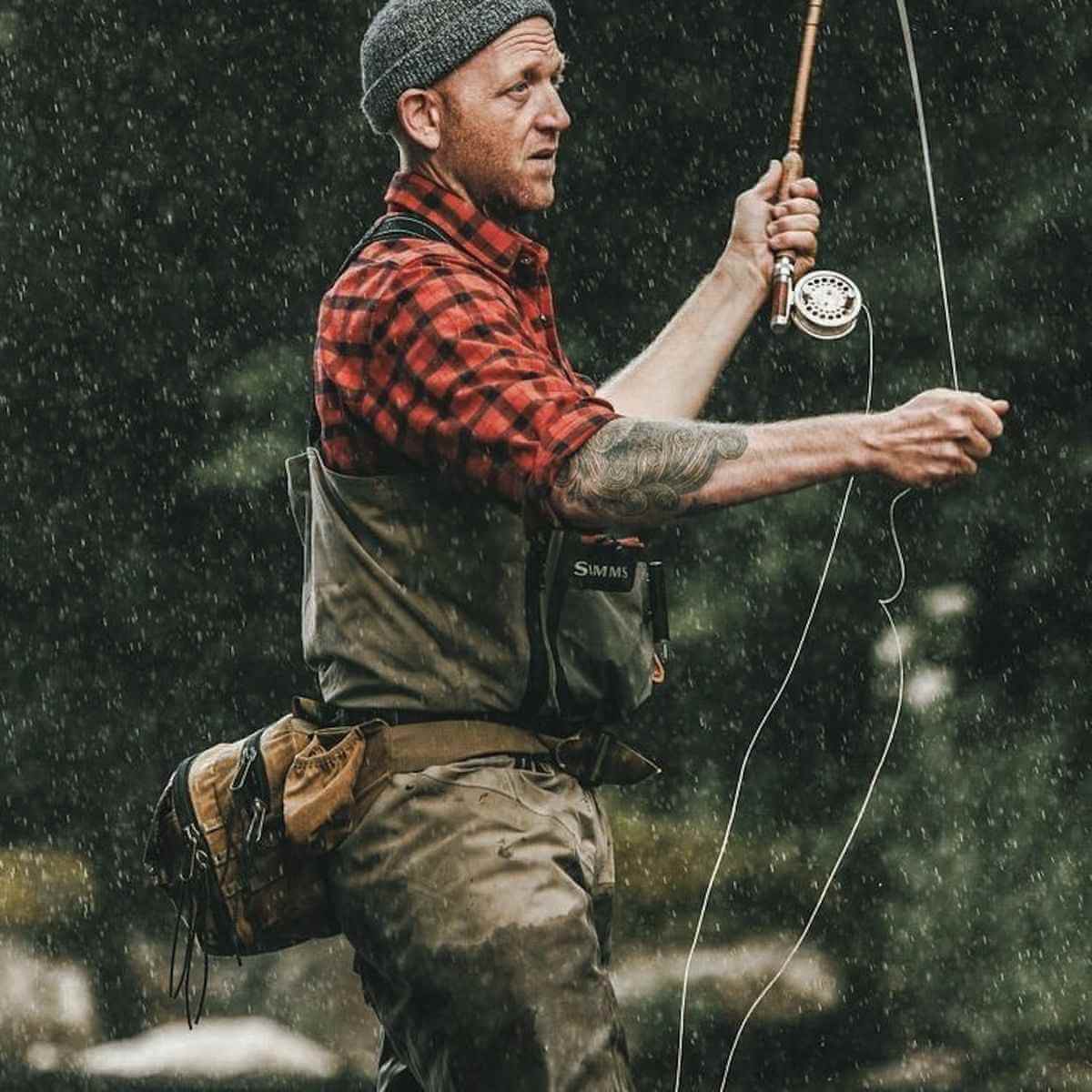 Instructor Drew Cano teaching knot-tying to new anglers