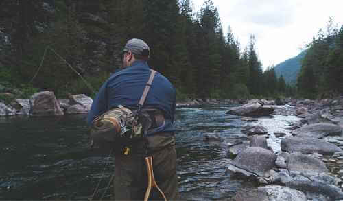 Fishing Club Canada coach teaching basic casting techniques on a dock